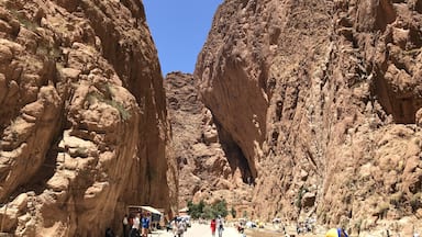 Inside the Todra Gorge in Tinerhir Morocco. On the weekends this is a popular place for locals to relax, play music, picnic and kids playing in the water. #morocco #todgha #todghagorge #travel #travelmorocco #sandatone #rivergorge #africa #northafrica #flashpackingbarbie #slowtravel #earthbound #Tinerhir