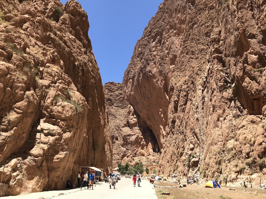 Inside the Todra Gorge in Tinerhir Morocco. On the weekends this is a popular place for locals to relax, play music, picnic and kids playing in the water. #morocco #todgha #todghagorge #travel #travelmorocco #sandatone #rivergorge #africa #northafrica #flashpackingbarbie #slowtravel #earthbound #Tinerhir