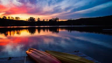 Kayaks and a colorful sunset at Lake Fairlee in Thetford Center, Vermont.

#goldenhour
