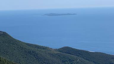 View of Giglio island and pristine Montecristo in the back from atop Monte Argentario. You must drive 10km towards the Convento della Presentazione al Tempio then once at the church take a visit and see the view there then drive additional 5km to reach the top of the mountain.