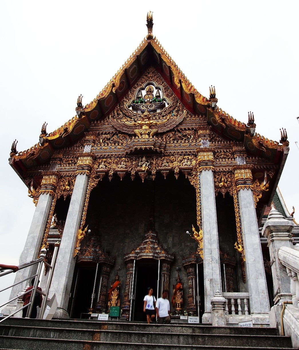 Entrance to a temple in Bangkok. It consist of too much detailed craftsmanship and architecture. I always enjoy these kind of constructions in Thailand. #Temple