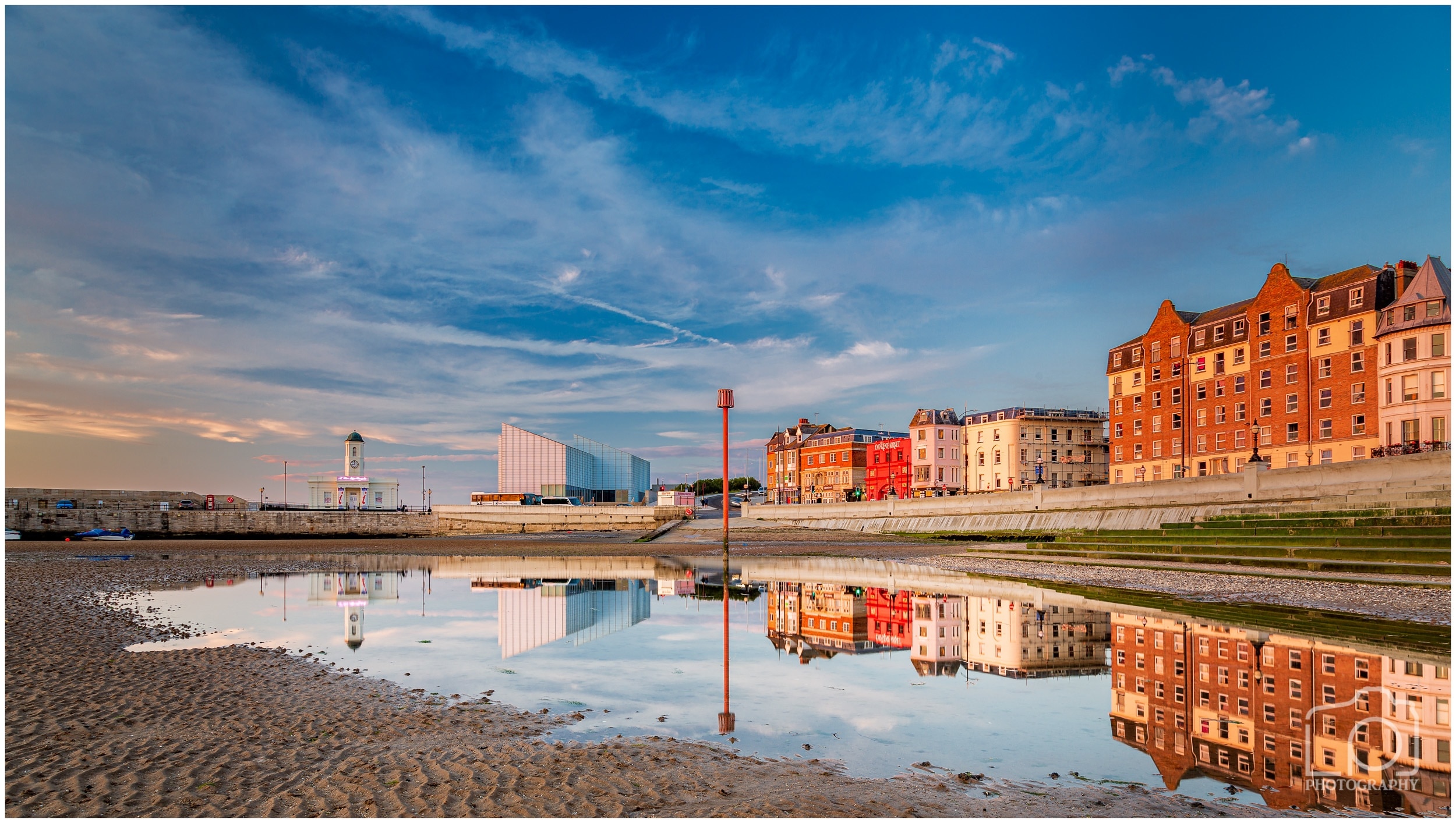 The Turner Gallery reflected in the pool left by the receding tide. The Kings Stairs is a great place to sit and watch the #sunset #margate #kent #thanet #reflections #travel #tourism #travel #staycation
I have really been struggling with a slump in my photography, i had no enthusiasm to get out and found it a real struggle. Tonight i decided i had to get out and shoot, i gathered all my gear, jumped in the car and headed out to capture Sunset at Margate, Kent.

I parked a few streets away and walked down to the seafront and thus avoided any car parking charges 

https://www.youtube.com/watch?v=9jWmO8X8Yx8