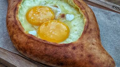 Georgian хачапури по-аджарски (cheese-filled bread with eggs) for dinner 
#russia #travel #traveltorussia #culture #cultural #explore #explorerussia #vacation #vacationvibes #summervacation #summer #summertrip #tourist #tourism #trynewthings #exploretheworld #seetheworld #travelblogger #blogger #travelphotography #yum #eat #georgia #foodforward #tripofalifetime #caucasion #gotravel #caucasus #lovetotravel #wonderfulplaces