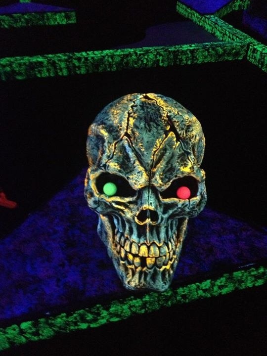 This is a very small indoor mini golf place but it has all the Halloween spirit you need.   It's the perfect place for a first date and really inexpensive. The black lights make everything look so frightening, yet cool. 