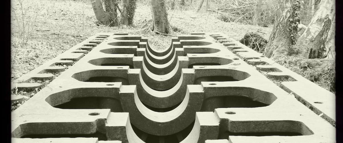 Massive engine block outside the museum.