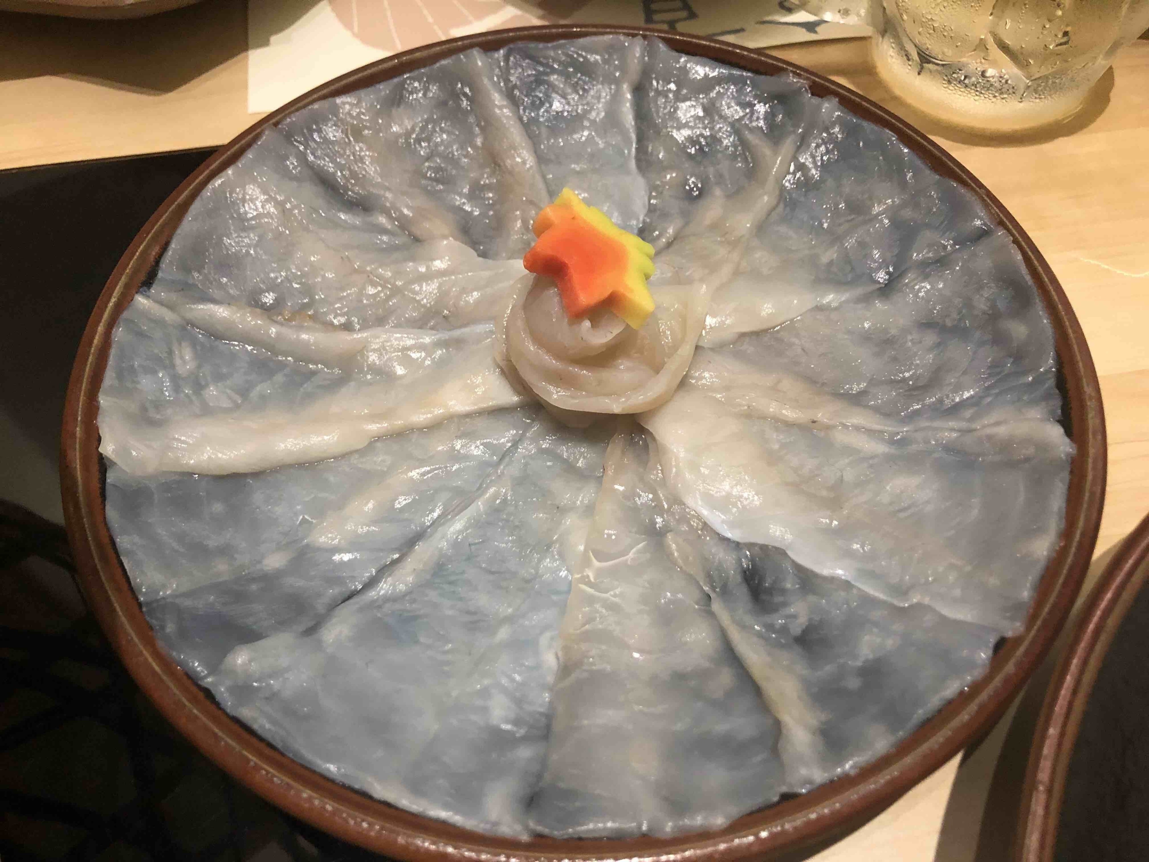 This is puffer fish sashimi from Guenpin Fugu & Snow Crab Japanese Restaurant. First time trying it since you rarely had the chance to eat puffer fish in Singapore. Nice environment and quite yummy food!