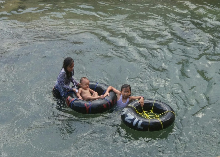 Children playing in the river in Bukit Lawang, North Sumatra