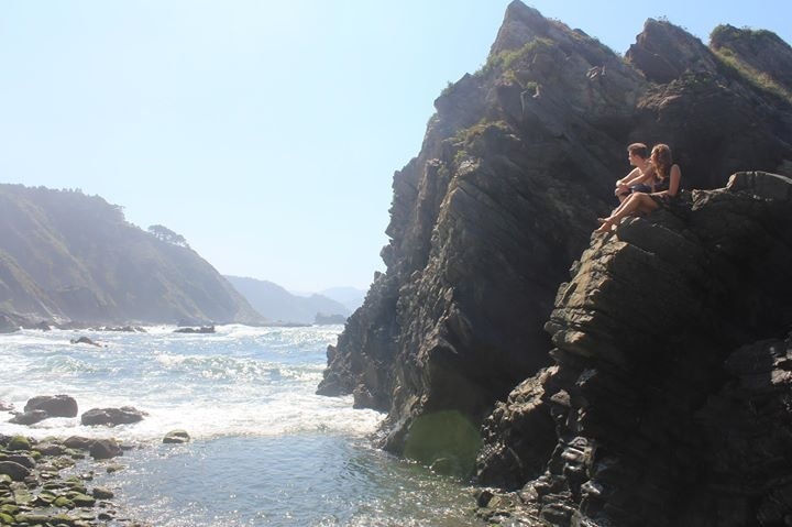 Walking over hard rocks, passing the tourists, you find this beautiful part of Asturias. It's hidden at the end of a rough path, but definitely worth it. Enjoy the view and sound of the waves crashing by climbing on a rock. It's very peaceful.