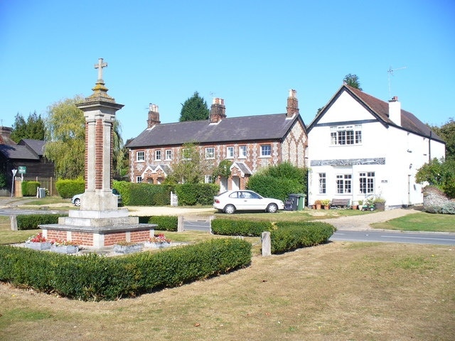 Chipperfield War Memorial Sited at the north-east corner of the common. Old flint and brick cottages line the roadside.