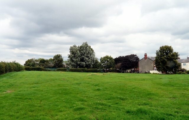 Field at Littlemoss A green field behind Littlemoss High School between Wayne Close and Andrew Street.