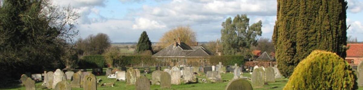 Photo "Part of the parish churchyard of St Mary the Virgin, Wimbotsham, Norfolk" by Evelyn Simak (Creative Commons Attribution-Share Alike 2.0) / Cropped from original