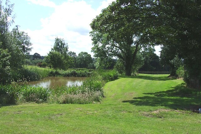 Landscaped Pool, Stapeley Farm, Shropshire The brook has recently been blocked to form two attractively landscaped pools (yet to be marked on OS maps), so the course of the public footpath has to be guessed - a lovely place though, in view of the refurbished old farm buildings.