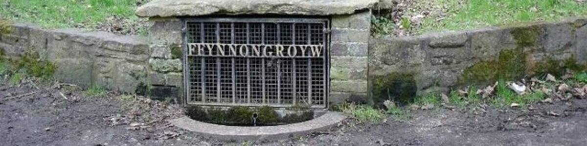 Photo "Ffynnongroyw. The village of Ffynnongrowyw name translates from the name from the 'clear well' pictured." by Dot Potter (Creative Commons Attribution-Share Alike 2.0) / Cropped from original