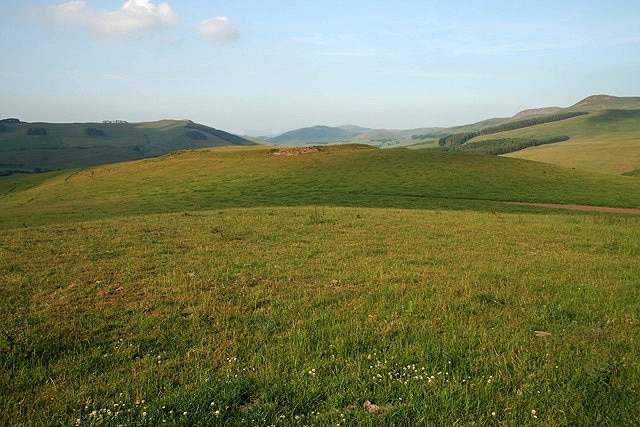 A hill fort on Morebattle Hill A small fort to the northeast of the main summit hill fort, viewed on a fine evening in late June.