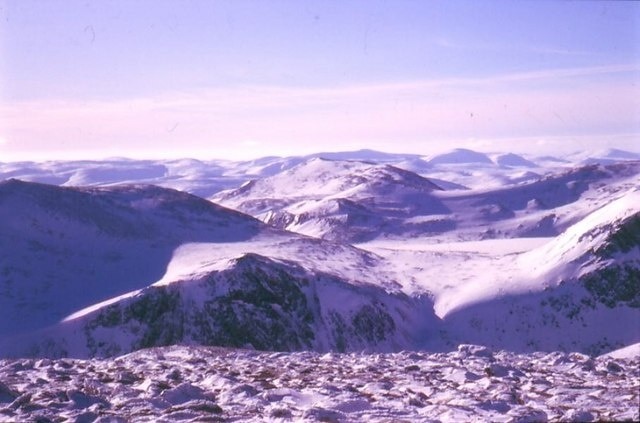 South from Stob Coire an t-Sneachda A view from Stob Coire an t-Sneachda, over the hidden trough of Loch Avon to a frozen Loch Etchacan to Derry Cairngorm and the South.