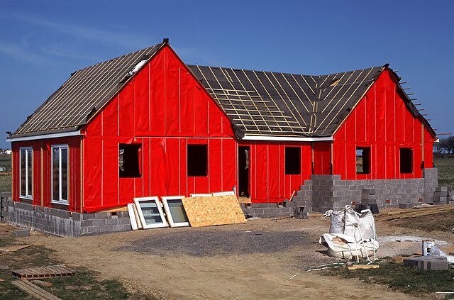 House under construction at Mybster The startling red colour of the insulation materials comes as something of a shock in the Caithness wilderness. You could see this for miles!