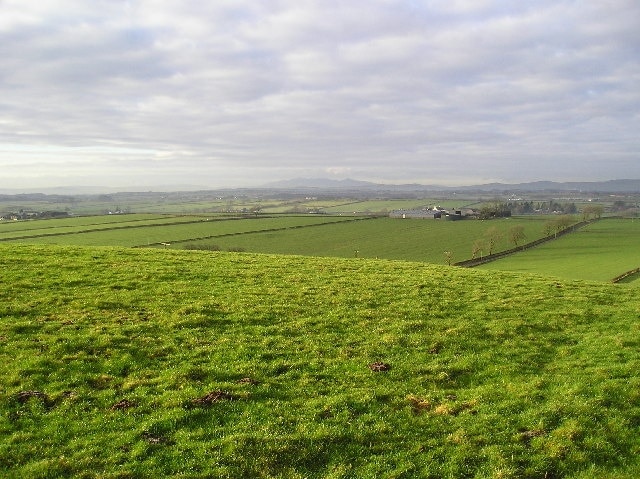 Fields. View to Cauldhame Farm and surrounding Fields. On the horizon in the centre of the picture are the hills of the Island of Arran.