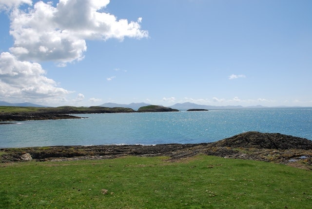 Looking across to Dinas Trefri and Dinas Bach The hills of the Llŷn Peninsula on the horizon.