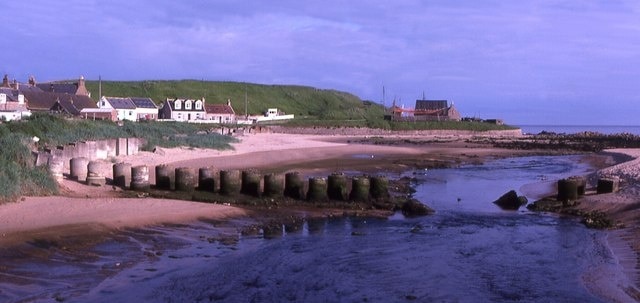 Port Erroll. Port Erroll lies on the banks of the Water of Cruden. In the foreground are the remains of wartime anti-tank defences.