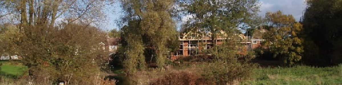Photo "Ford. Ford of the river Great Ouse as it passes Clapham, looking across towards a new house being built on the far (Clapham) side. The ford itself doesn't look particularly suitable for normal cars ;-) (it's only a bridleway and farm track on the photographer's side)" by Oliver White (Creative Commons Attribution-Share Alike 2.0) / Cropped from original