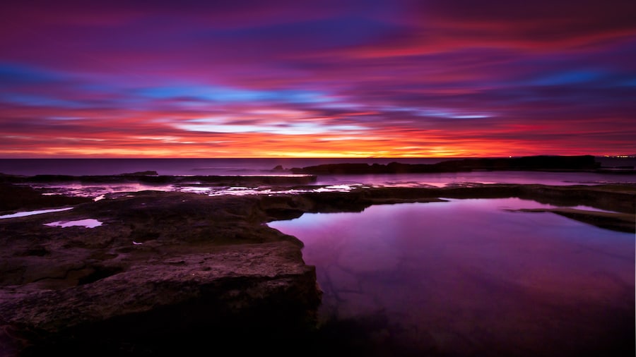 Photo "Sunset on the coast of Llucmajor, Mallorca" by Andrés Nieto Porras (Creative Commons Attribution-Share Alike 2.0) / Cropped from original