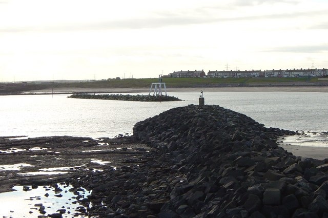 Breakwaters in Newbiggin Bay The breakwaters have been constructed to protect the sand on the beach.