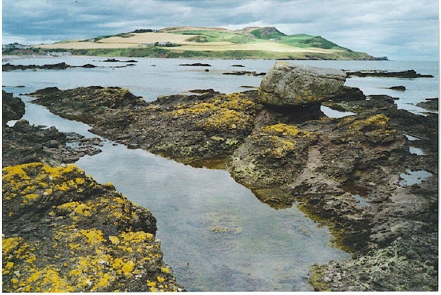 Foreshore at Bervie Bay. Bervie Bay, looking north to Bervie Head, taken from the coastal path to Gourdon. Bervie Beach is just visible far left, famous for its rounded pebbles.