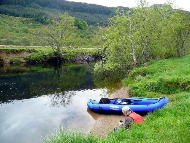 Time for a break Rest time on the River Balvag. The transit from Balquhidder to Loch Lubnaig is a pleasant day's trip.