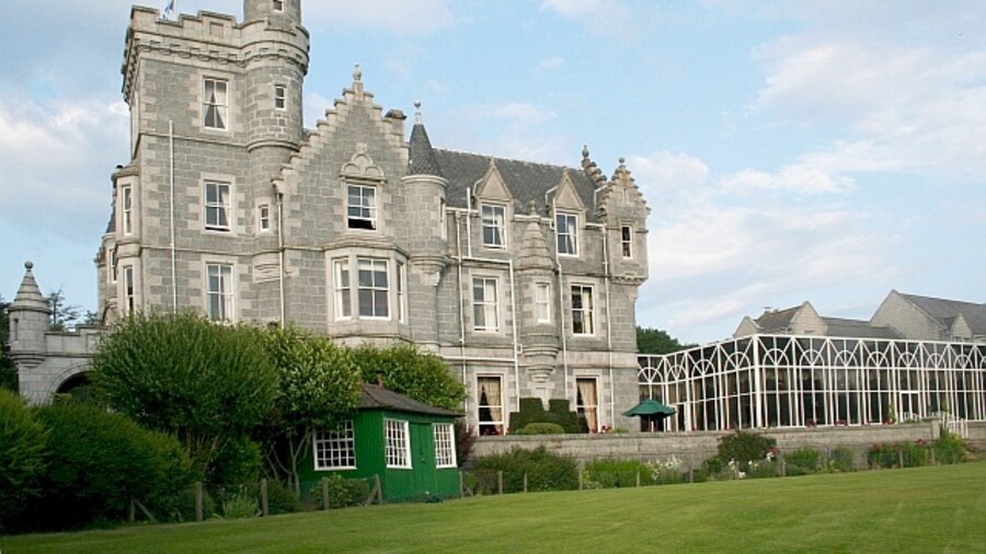 Photo "Macdonald Ardoe House Now a hotel, once a 19th century mansion house inspired by the royal residence of Balmoral Castle, a few miles upstream. Can be used for weddings, banquets and daughter's graduation ball." by Bob Embleton (Creative Commons Attribution-Share Alike 2.0) / Cropped from original