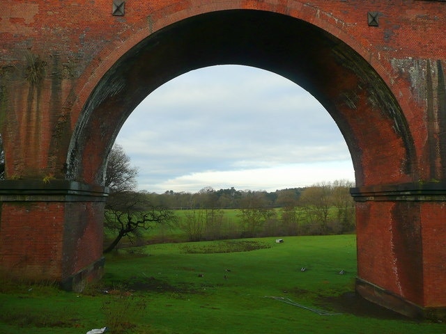 The Twemlow Viaduct 4 View north-west through one of the vast arches across pasture land along the River Dane.