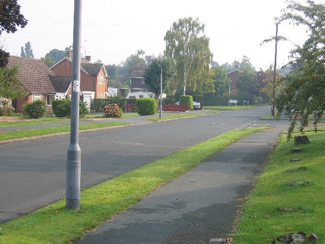 Richmond Way, Fetcham. A pleasant suburban street which becomes clogged twice a day as parents pick up their children from the nearby school.