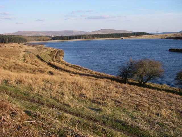 Llangynidr Reservoir in evening sunshine A lonely spot at the head of the Afon Ebwy/Ebbw River. The distant hills are those surrounding Ebbw Vale.