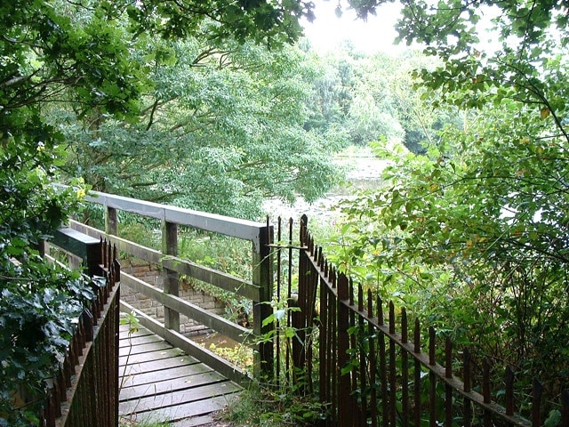 Footbridge at Worthington Lake Reservoir. Situated at the North end of Worthington Lake - a minor reservoir - this footbridge maintains an ancient right of way across the head of a flooded valley.