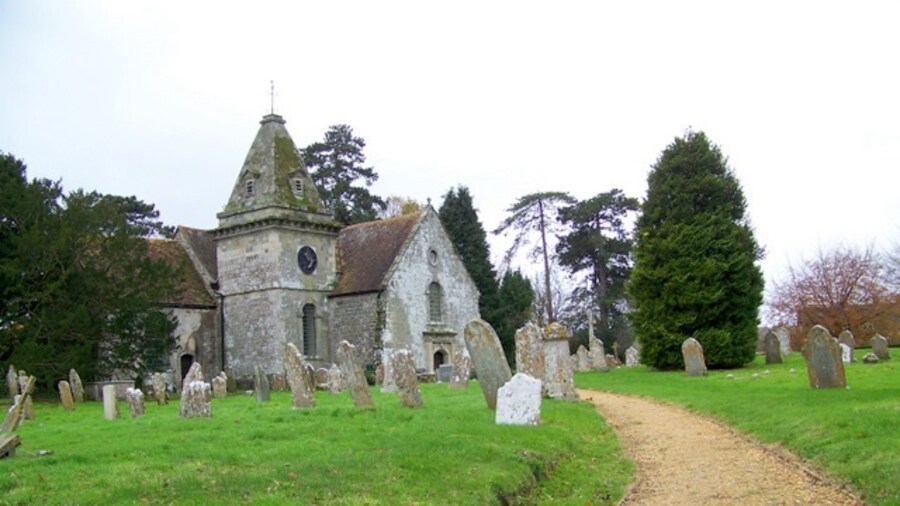 Photo "Church of St Wolfrida, Horton The church has its origins in the 12th or 13th centuries with restorations in 1869 and 1900. The tower is either by or influenced by Vanbrugh who was working locally. St Wolfrida, who died at Horton as the Abbess of a nunnery. It is the only church in the county dedicated to this lady." by Trish Steel (Creative Commons Attribution-Share Alike 2.0) / Cropped from original