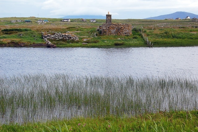 Ruin on shore of Loch na Bagh, South Uist Another ruined house in South Uist. This part of the island is patterned with long strips of croft land.