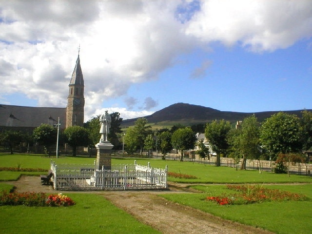 Rhynie Village Green, the church and the Tap O'Noth in the background, Aberdeenshire