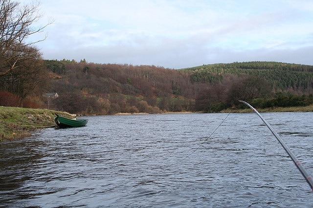 A salmon angler's point of view on Junction Pool at Rothes. It's February and the water is fairly cold; still the call of the spring salmon cannot be resisted! With a 15 foot long fly rod in one hand and camera in the other my intention was to show the sport literally from the angler's point of view. Within seconds of this picture being taken a fish did take the fly and if you look at the other pictures in this series you will see the results.