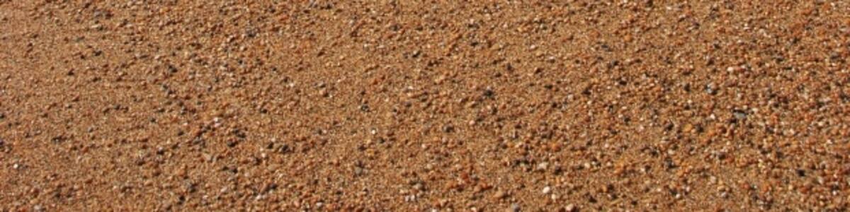 Photo "Burton Bradstock: Burton Beach Looking along the beach towards Burton Cliff." by Eugene Birchall (Creative Commons Attribution-Share Alike 2.0) / Cropped from original