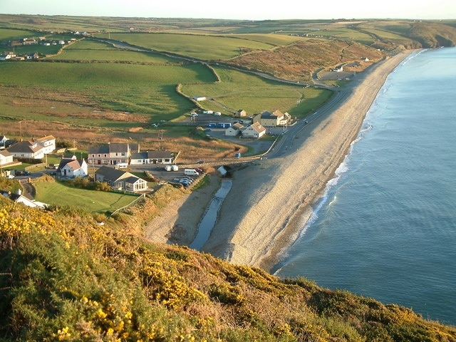 Newgale Beach The pebble bank runs the whole length of Newgale beach, which at low tide is composed entirely of firm sand.