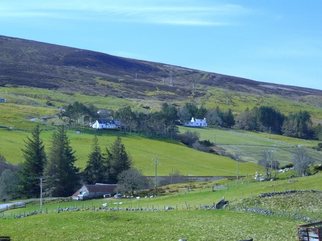 Croftand at Muie. The rail line to Wick passes up the valley below.