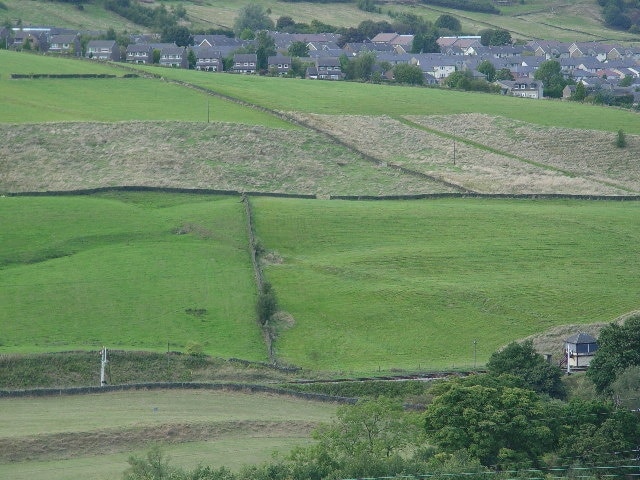 The Worth Valley. Looking down to the Keighley & Worth Valley Railway, with the houses of Harewood Hill, Oakworth, above.