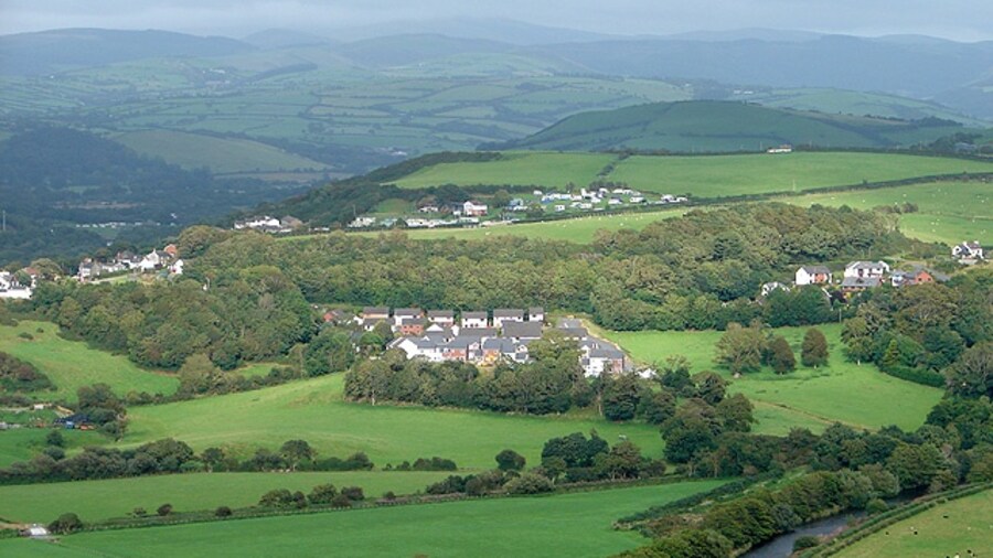 Photo "Looking towards Southgate from Allt-Wen Southgate is a suburb of Aberystwyth. Afon Ystwyth is seen in the foreground and Duffryn Rheidol is the next valley." by OLU (Creative Commons Attribution-Share Alike 2.0) / Cropped from original
