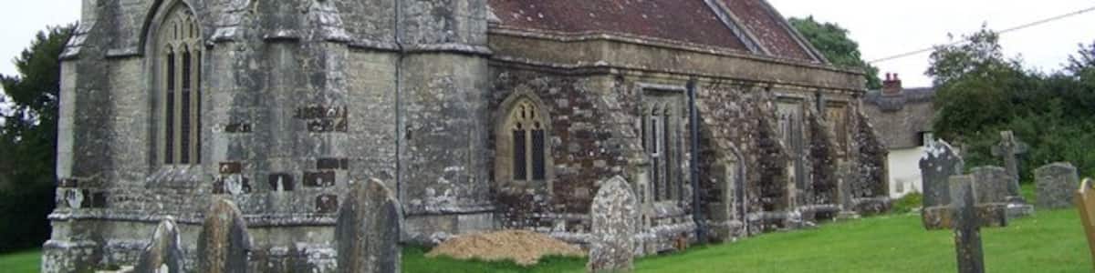 Photo "Church of the Holy Rood, Wool Holy Rood church sits conveniently in gently rising ground in what is now the south part of Wool, although there is a tradition among villagers that the church originally formed the central point in the village." by Trish Steel (Creative Commons Attribution-Share Alike 2.0) / Cropped from original