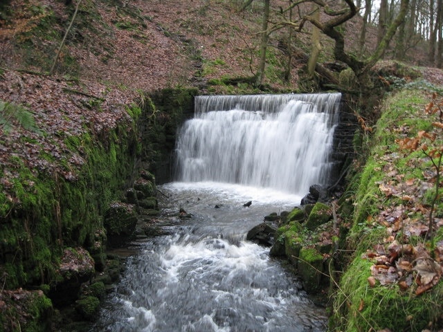 Waterfall in Woodhey Valley This waterfall is located down a quiet valley just off the beaten track between Holcombe Brook and Brooksbottom.