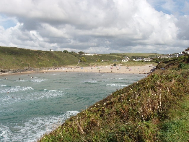 Porthcothan beach. View near high tide, looking inland from the south of this long inlet. At low tide the area which is sea in the photo becomes a large sheltered beach.