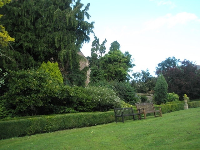 Sloping seats in Dunster Memorial Village Gardens