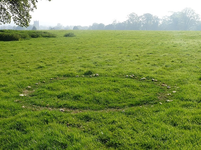 Fairy Ring in Moorat's Park. Close to 1054413, which can be seen to the left, this view includes St Mary's, Dedham in the background and a large expanse of open grassland. This piece of National Trust land is hidden away off the Dedham - Stratford road and served by a small lay-by on the north side of the road. The approach is up a narrow track through woodland, with plenty of these 1308878, before opening out into a grassy hill, with a few trees and commanding views over Dedham and its Vale.