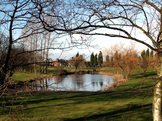 Silkstone Golf course pond and Clubhouse From the footpath to Silkstone Falls.