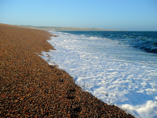 Chesil Beach; water's edge Looking south-east. This scene was close as I dared get to the sea being driven onto the beach by a stiff south-westerly. Note; I attempted to get to SY6575 but it would have meant a very dangerous swim. Although I had arrived right on low tide, the weather was pushing the waves over all of this very marginal square