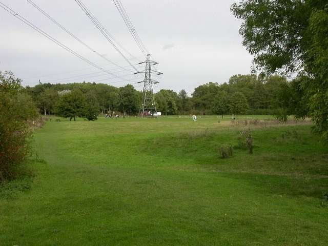 Meadow. Looking towards the Visitor Centre and picnic and parking areas, Irchester Country Park.